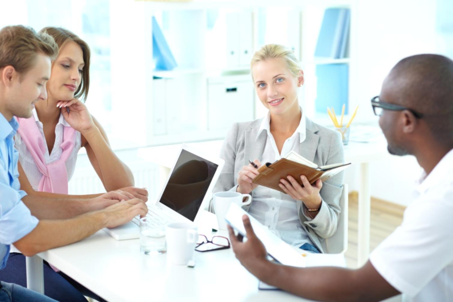 Team meeting discussing financial strategy and investor communications