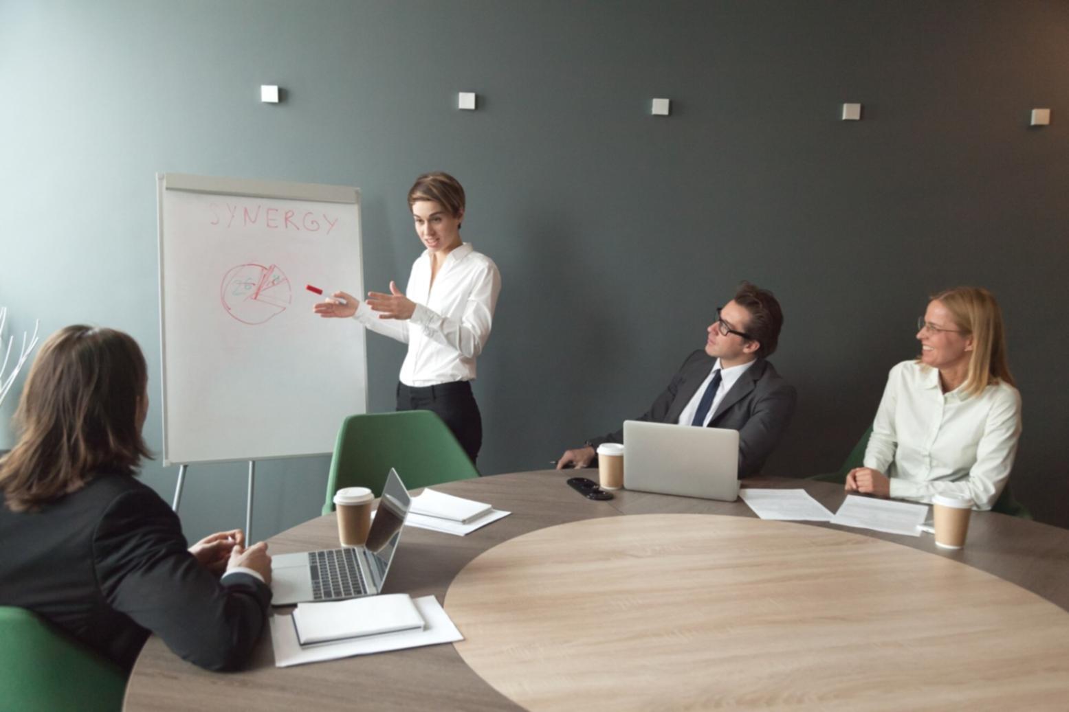 Professional reviewing quarterly financial reports and preparing stakeholder communications